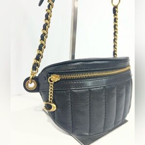Coach quilted belt bag or cross body. Black with brass hardware.